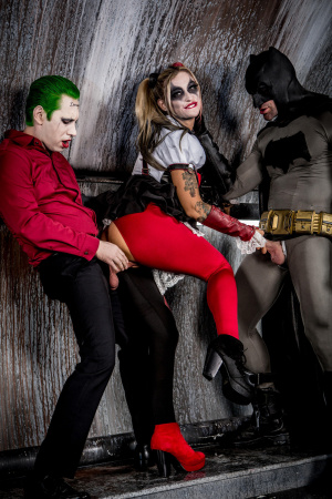 Superhero Kleio Valentien sandwiched between Joker and Batman